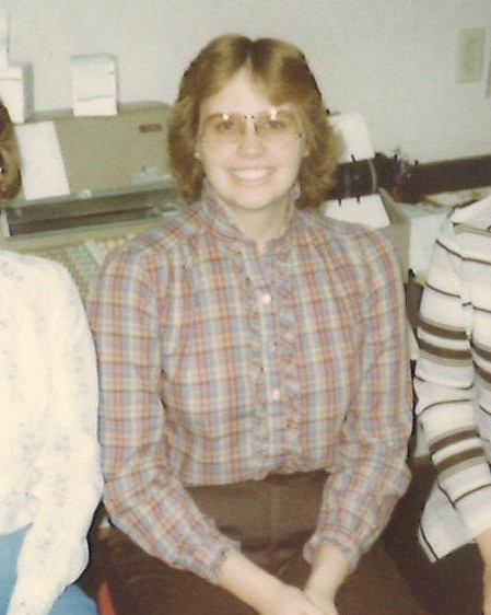 Donnis in her first banking role as a bookkeeper in 1982.