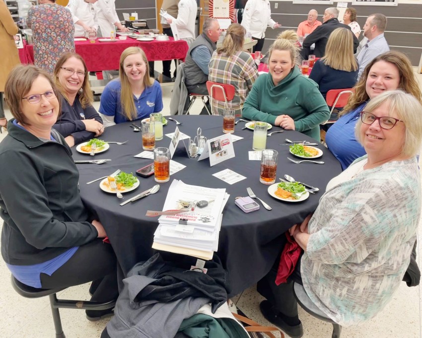 Donnis with other Hampton staff at a school event.