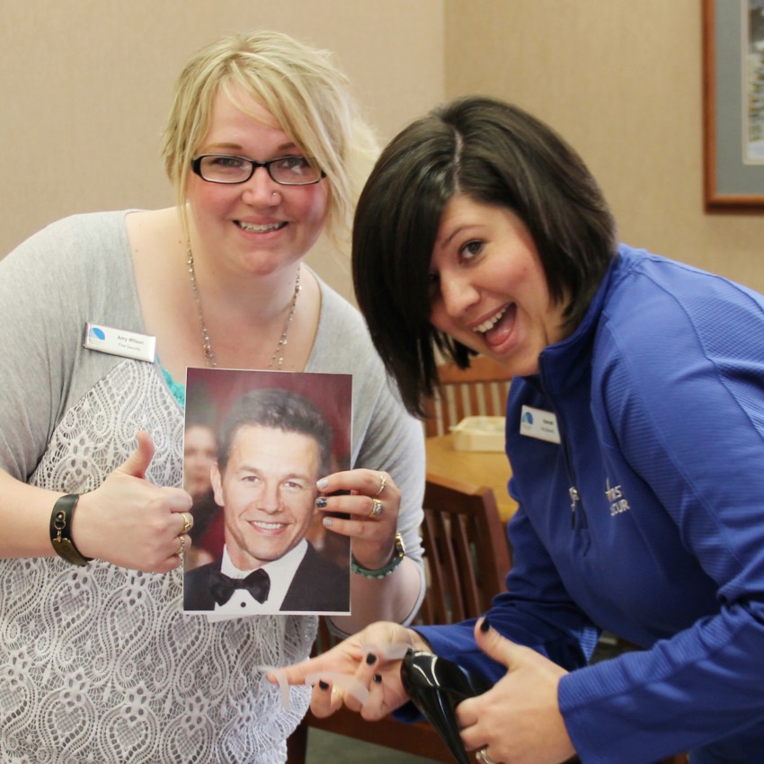 Hannah met one of her best friends, Amy Wilson, at First Security. Here they are about to prank President/CEO Kurt Herbrechtsmeyer as payback for beating them in a fundraising game of trivia.