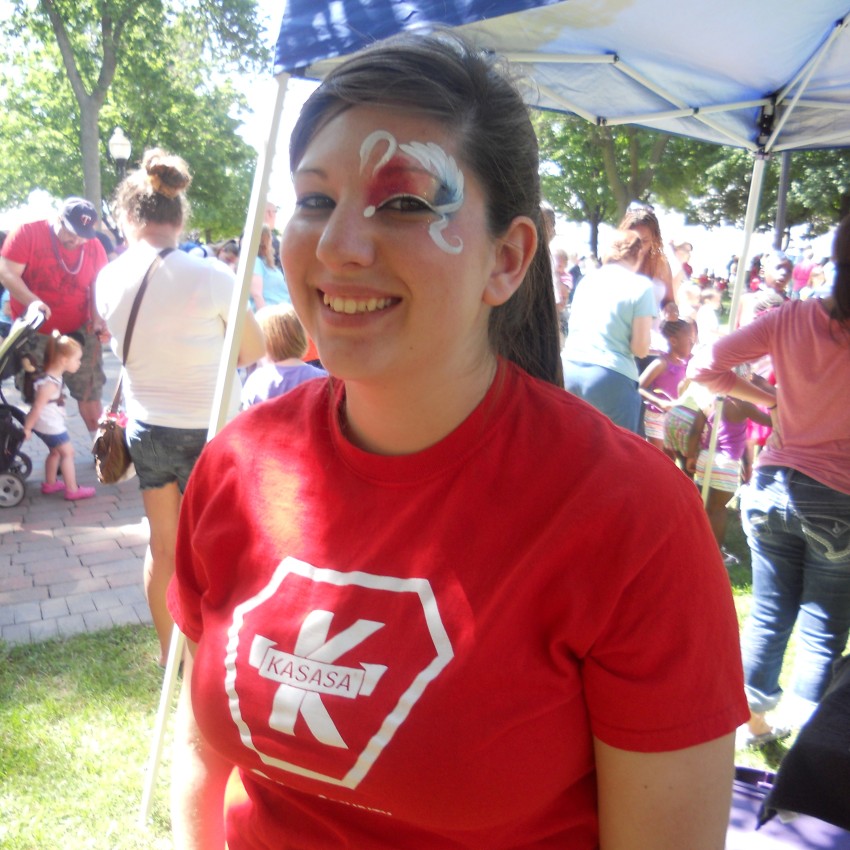 Hannah working at Charles City’s Independence Day Kids Day event on behalf of First Security shortly after she started working at the bank.