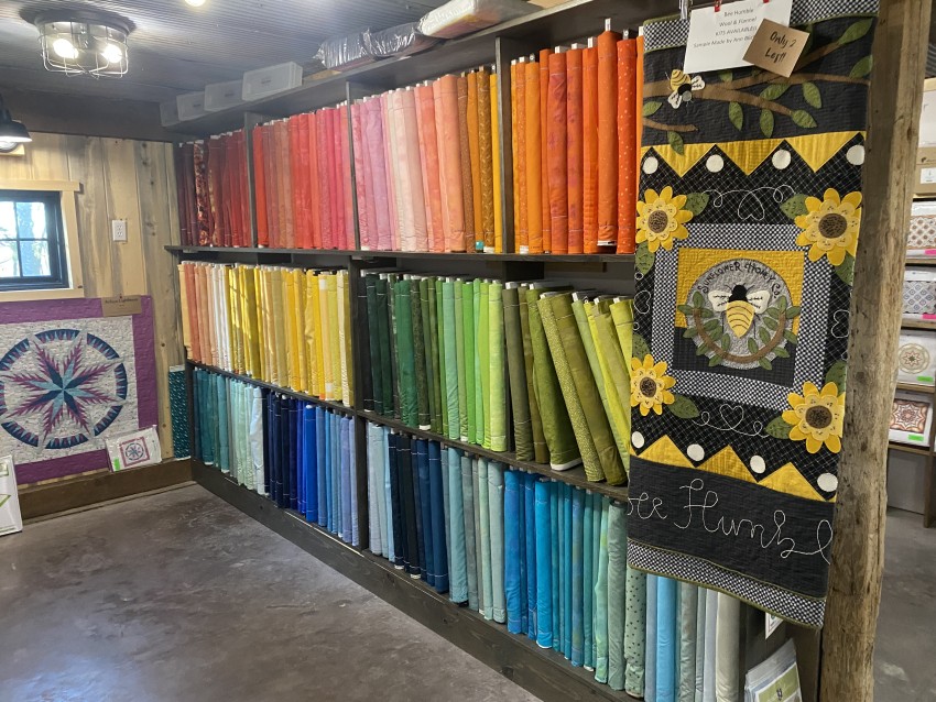 Colorful fabric on shelf.