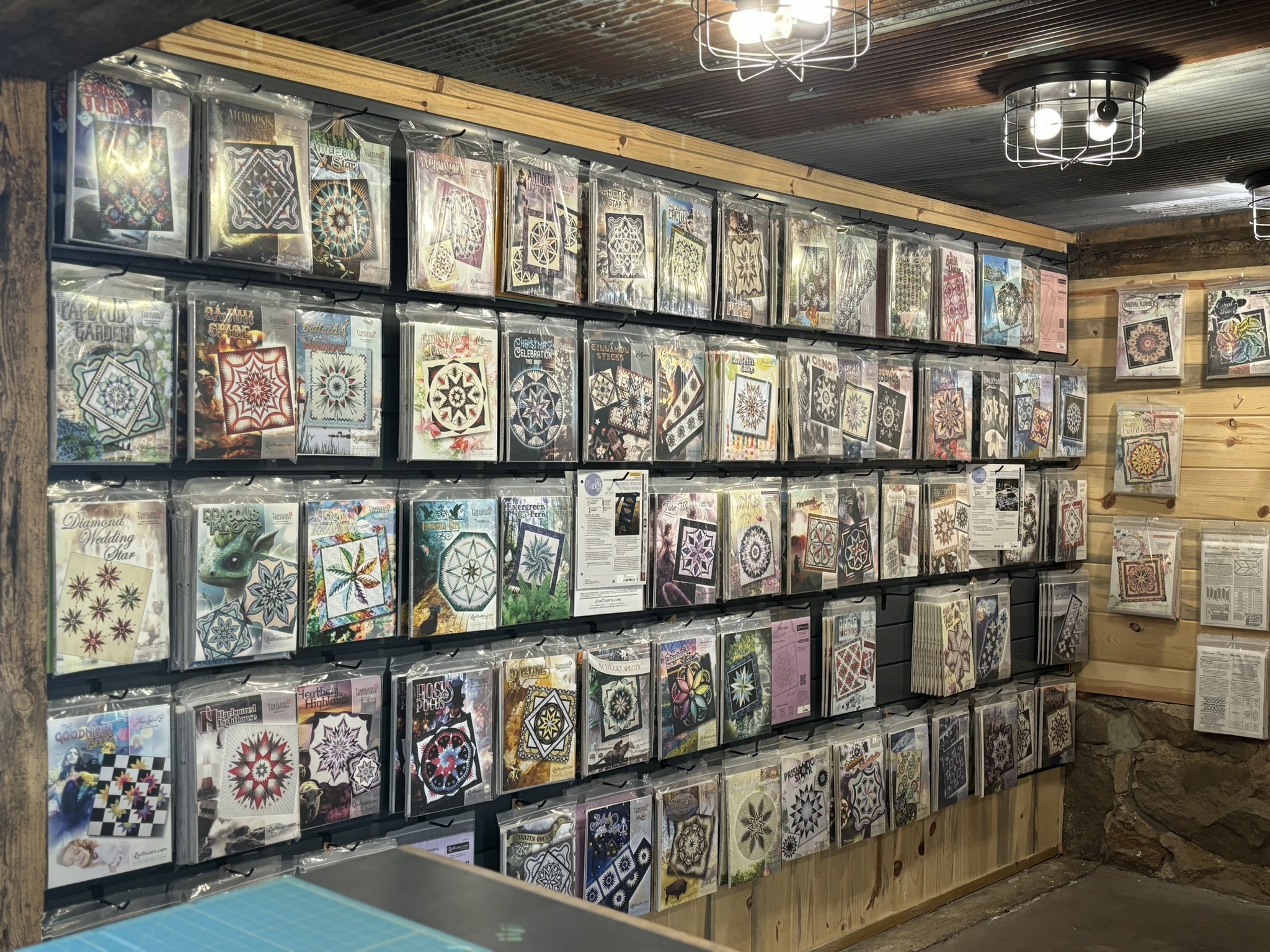 Quilting patterns on shelf.